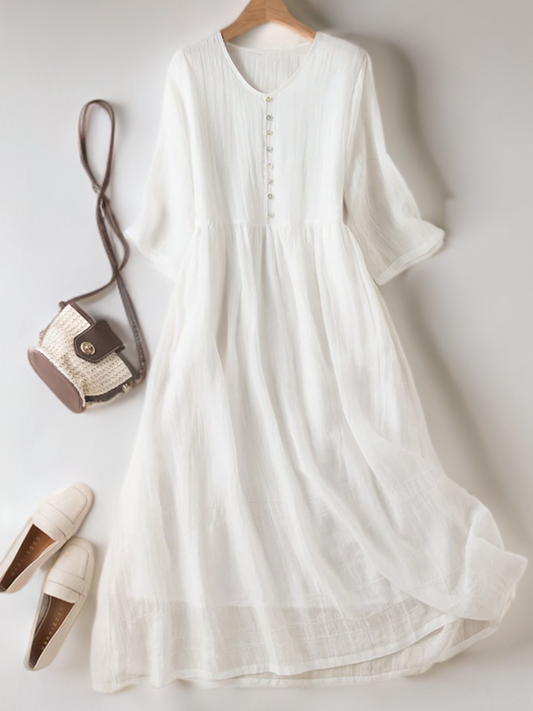 JO | Retro dress with V-neck and simple mid sleeves